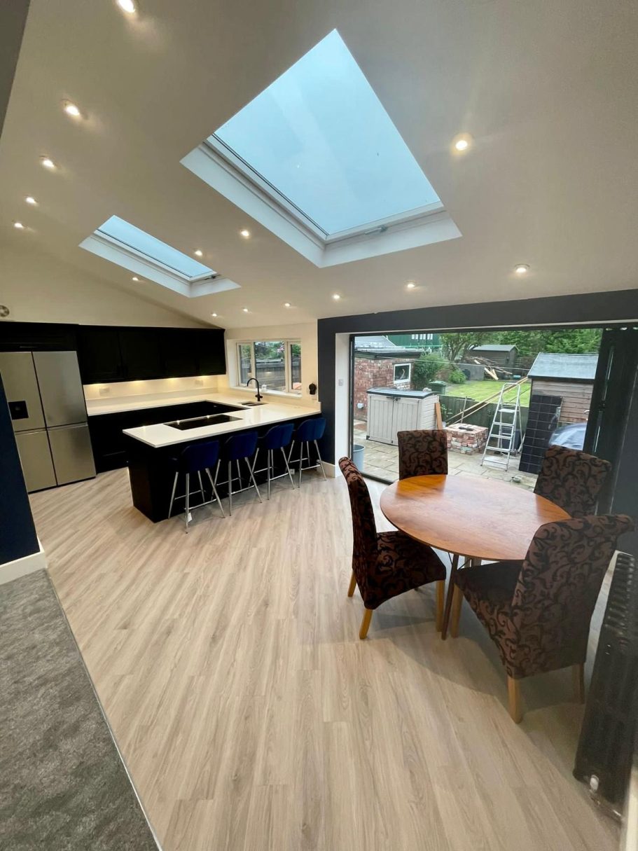Modern Kitchen & Dining Room Extension Open-plan kitchen and dining extension with skylights and garden view