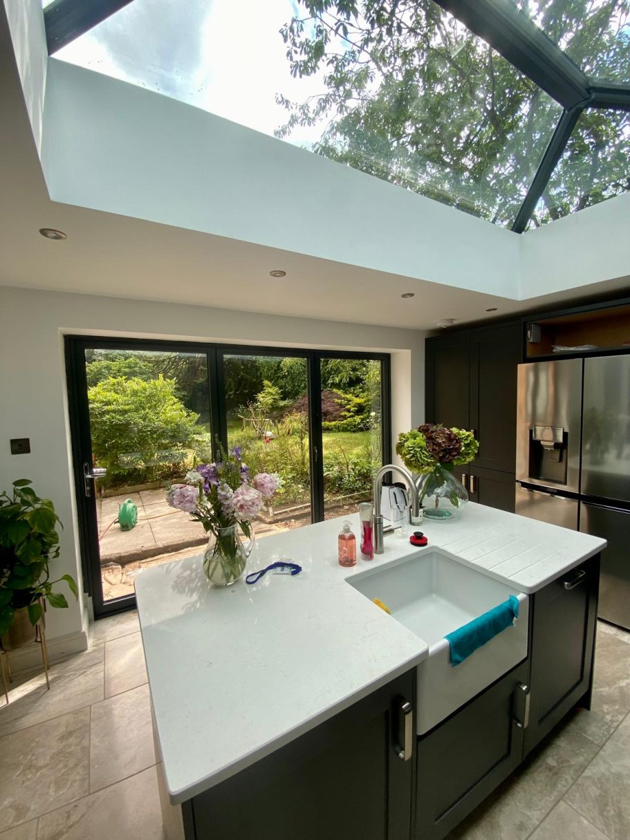 Bright Kitchen Extension with Island Kitchen extension with skylight, island unit and garden view