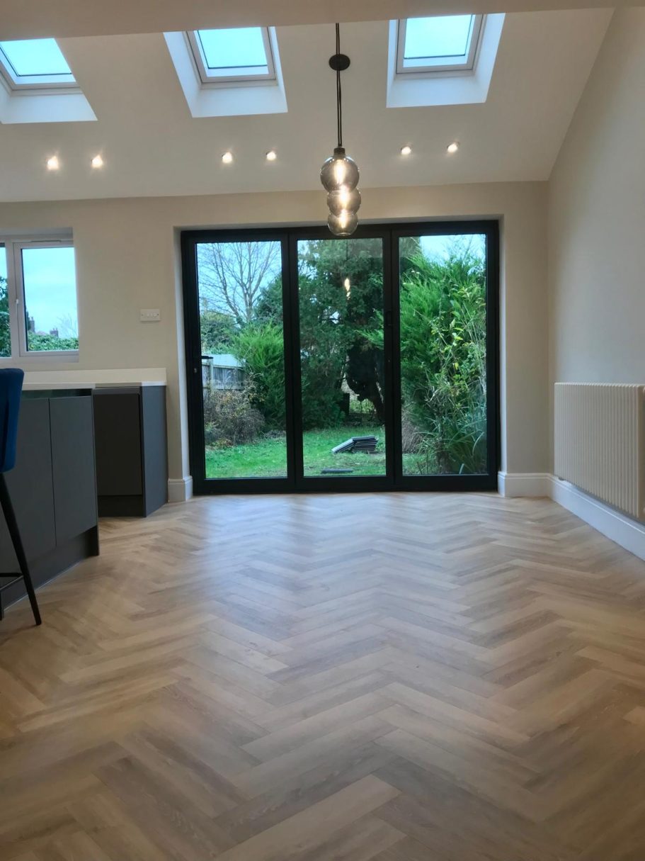 Dining Room Extension with Garden Access Dining room extension with parquet flooring and bi-fold doors